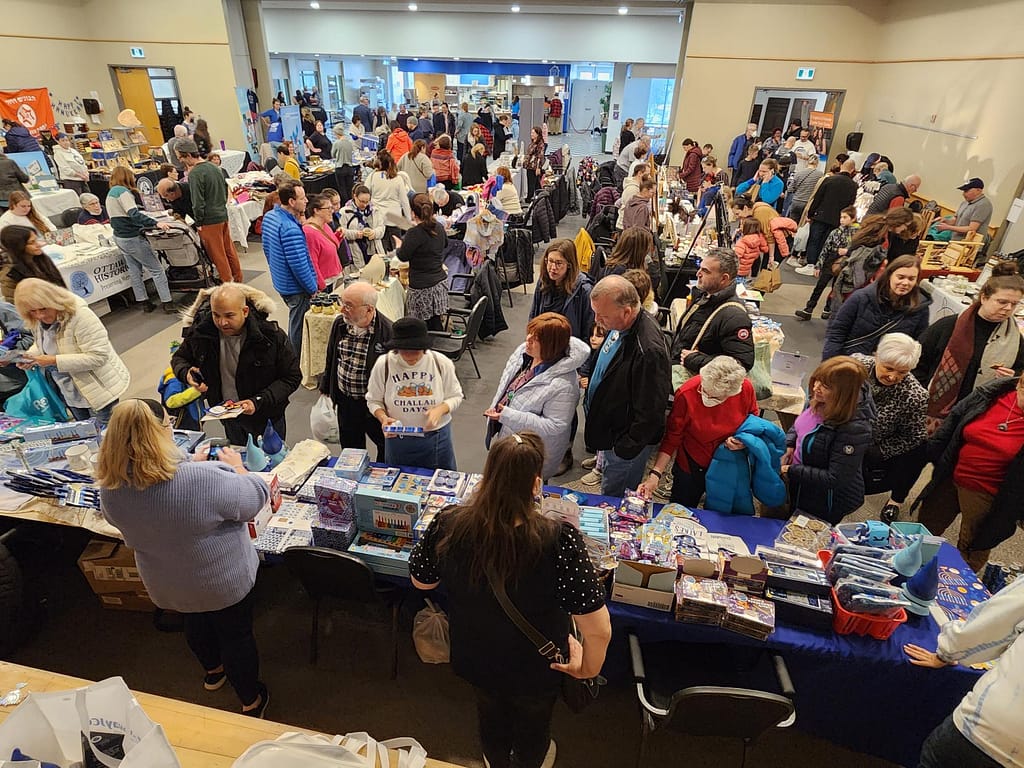 A crowd of people at the gift fair.